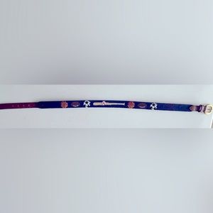 Child’s Needlepoint Belt. Sports motif. Great condition. Navy background.
